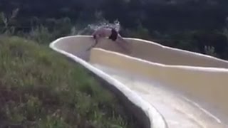 Man flies off waterslide onto rocky cliff [upl. by Akener876]